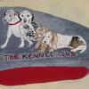 The Kennel Club are the four dogs shown, the smaller brown dog had to be put down, so this became a memorial of that time.